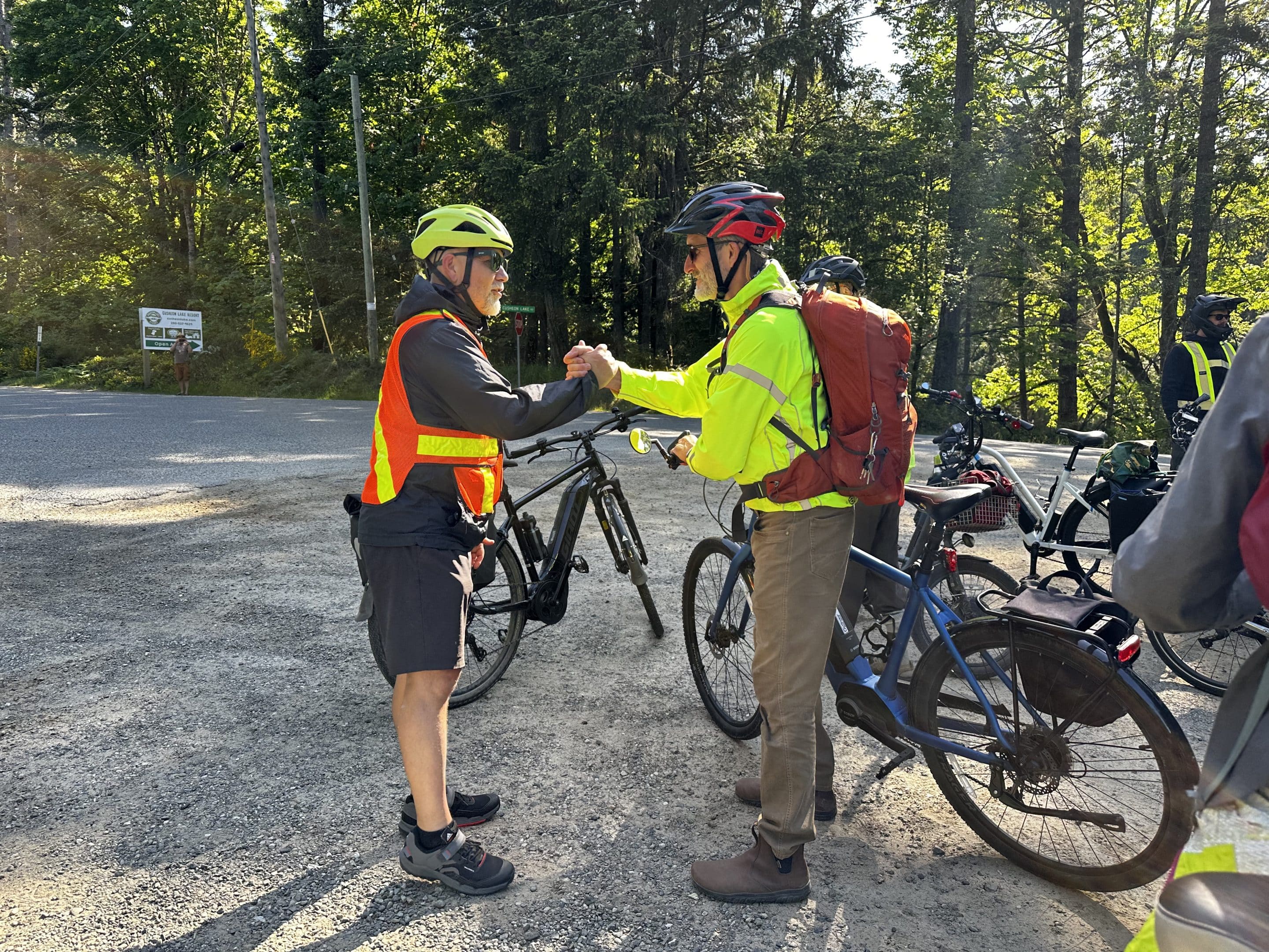Adam Olsen, MLA meeting Bryan Young from Transition Salt Spring on the morning bike ride.